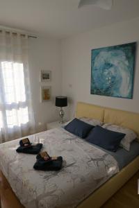 Posteľ alebo postele v izbe v ubytovaní Lola suite