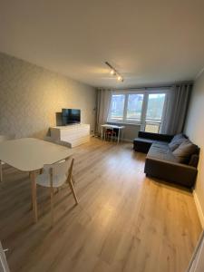Khu vực ghế ngồi tại SZPITAL ZDROJE Apartment