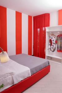Postel nebo postele na pokoji v ubytování Guest House Le Tre Isole Sorrento
