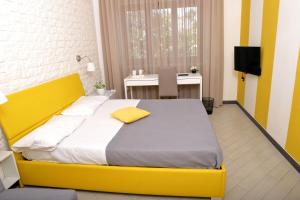 Postel nebo postele na pokoji v ubytování Guest House Le Tre Isole Sorrento