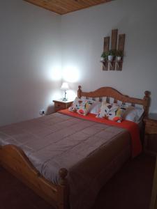 a bedroom with a large bed in a room at Casa Raco in Raco