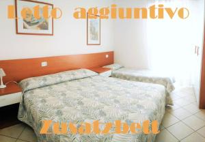 Ένα ή περισσότερα κρεβάτια σε δωμάτιο στο Green Holiday Wohnung mit Schwimmbad +13 φωτογραφίες
