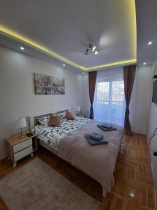 Krevet ili kreveti u jedinici u okviru objekta Apartman Ljiljana LUX Sombor