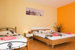 Posteľ alebo postele v izbe v ubytovaní Holiday House Jagoda
