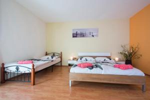 Posteľ alebo postele v izbe v ubytovaní Holiday House Jagoda