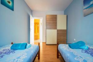 Posteľ alebo postele v izbe v ubytovaní Holiday House Jagoda