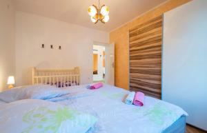 Posteľ alebo postele v izbe v ubytovaní Holiday House Jagoda