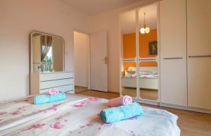 Posteľ alebo postele v izbe v ubytovaní Holiday House Jagoda