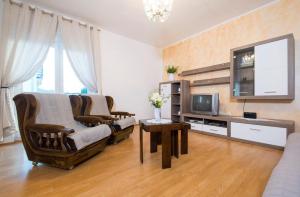 Televízia a/alebo spoločenská miestnosť v ubytovaní Holiday House Jagoda