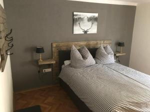 Rúm í herbergi á Appartement Brettljause Ferienhaus Fuenf Sinne