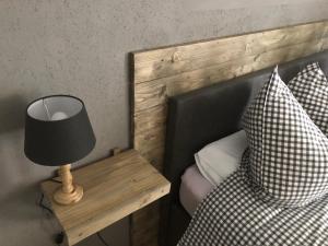 Rúm í herbergi á Appartement Brettljause Ferienhaus Fuenf Sinne