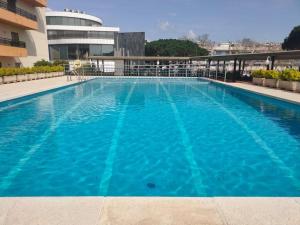 Bazén v ubytování Apartament Neptuno Platja d'Aro nebo v jeho okolí