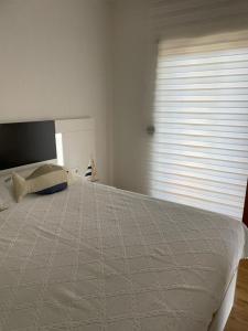 Postel nebo postele na pokoji v ubytování Apartament Neptuno Platja d'Aro