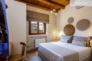 Postel nebo postele na pokoji v ubytování Atsipopoulo Villas