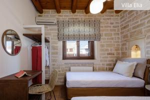 Postel nebo postele na pokoji v ubytování Atsipopoulo Villas