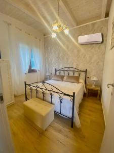 Łóżko lub łóżka w pokoju w obiekcie Chalet del girasole