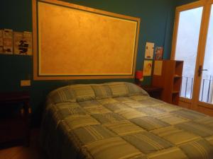 Ένα ή περισσότερα κρεβάτια σε δωμάτιο στο Casa Granma