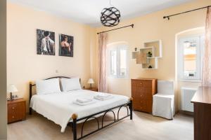 Кровать или кровати в номере Casa Corfiota