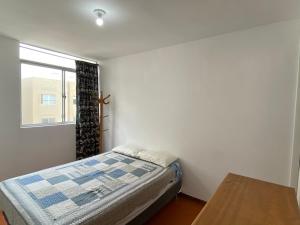 Ein Bett oder Betten in einem Zimmer der Unterkunft ACÉRCATE Aparts & Parking - SAN MIGUEL