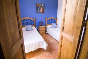 Posteľ alebo postele v izbe v ubytovaní Anju Villas Villas Vistas del Mar