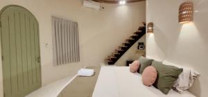 Voodi või voodid majutusasutuse Tiu Oasis Lombok toas