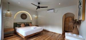 Voodi või voodid majutusasutuse Tiu Oasis Lombok toas