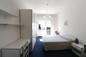 Postel nebo postele na pokoji v ubytování Hotel Savoia + 27 fotografií