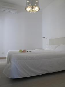 A bed or beds in a room at Penthouse Santa Croce