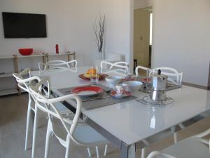 A television and/or entertainment centre at Penthouse Santa Croce