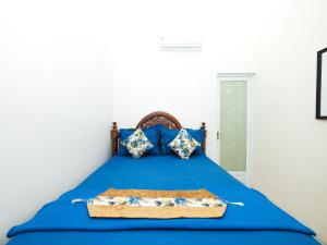 Postel nebo postele na pokoji v ubytování Griya One Family