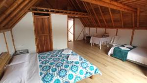 Postel nebo postele na pokoji v ubytování Villa Ester Hostel Vereda Cay
