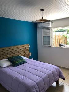 Postel nebo postele na pokoji v ubytování Villa Fleur de Lys