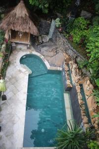 Výhled na bazén z ubytování Amed Paradise Warung & House Bali nebo okolí