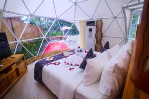 Postel nebo postele na pokoji v ubytování Triyana Resort and Glamping