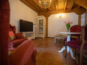 A television and/or entertainment centre at Belvilla by OYO Casa Rural Poza de la Torca II