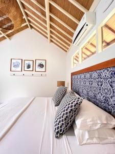 Postel nebo postele na pokoji v ubytování Eden Eco Resort