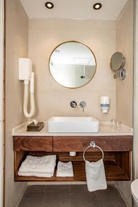 Ванна кімната в Montefiore Hotel By Smart Hotels