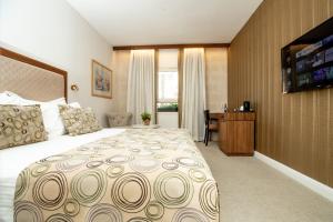 Ліжко або ліжка в номері Montefiore Hotel By Smart Hotels