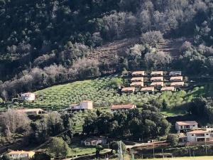 an aerial view of a village on a hill at Strada di a cuma in Vico