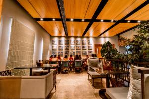 Ein Sitzbereich in der Unterkunft Sarovar Portico Jaipur