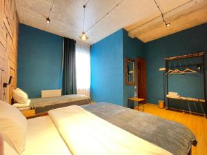 Llit o llits en una habitació de Hotel Misty Mountain