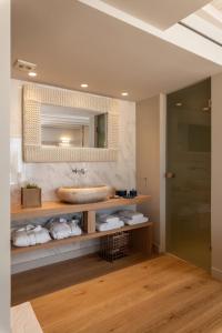 Kylpyhuone majoituspaikassa Oniro Suites