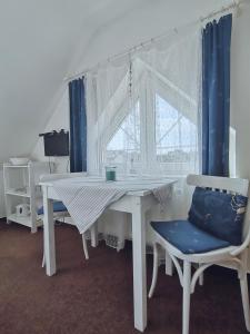 Postel nebo postele na pokoji v ubytování Penzion pod Kostelíčkem