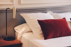 Cama o camas de una habitación en Alcazaba Premium Hotel