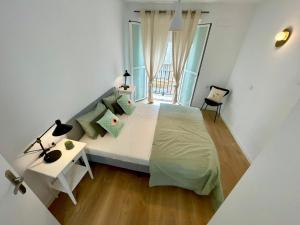 Posteľ alebo postele v izbe v ubytovaní GATU PREMIUM Villa Galeona, con terraza chillout privada
