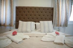Postel nebo postele na pokoji v ubytování Hotel Karagianni