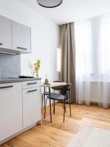Kuchnia lub aneks kuchenny w obiekcie limehome Villach Gerbergasse