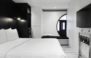 Katil atau katil-katil dalam bilik di Hotel Relax III