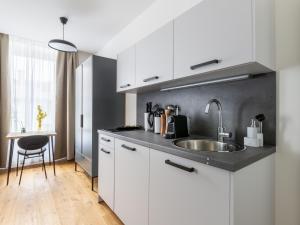 Kuchnia lub aneks kuchenny w obiekcie limehome Villach Gerbergasse