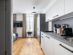 Kuchnia lub aneks kuchenny w obiekcie limehome Villach Gerbergasse